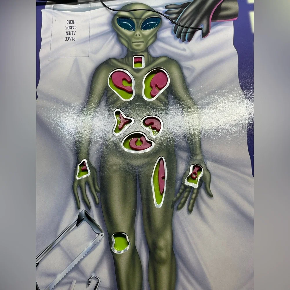 1997 DaMert Company Alien Autopsy Board Game. Game is missing one body piece.